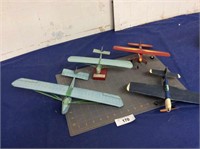 4 model airplanes (3 paper, 1 balsa)