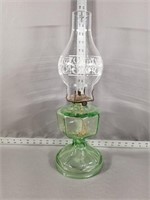 Green glass oil lamp
