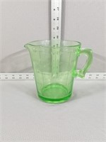 Green depression glass measuring cup
