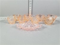 Pink Depression glass cups and plates