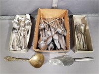 Assorted silverware and knifes