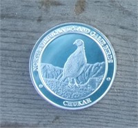 N. A. Hunting Club Art Coin Chucker
