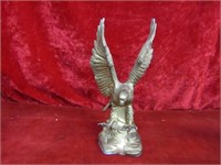Cast Brass/bronze Eagle figure.