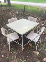 Set a 4 Costco folding chairs and card table