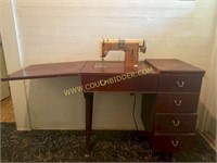 Kenmore Sewing Machine & cabinet