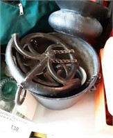 Cast Iron pot, antique iron pulley, spittoon.