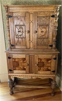 Wooden hutch with knight carving 36” x 16” x 64”