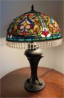 Tiffany style lamp with claw feet 28” tall