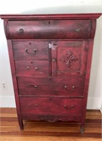 Vintage red stained wooden dove tailed chest