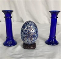 Glass candlesticks and blue porcelain egg