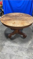 Vintage solid wood table  48” diameter on casters