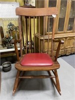 Antique Rocker with Red Leather Bottom