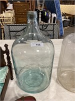 Large glass cellar bottle.