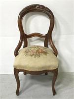 Antique carved walnut balloon chair w/ needlepoint