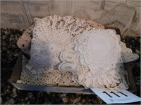 Beige or white vintage table scarves and doilies