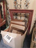 Eight wooden picture frames and more