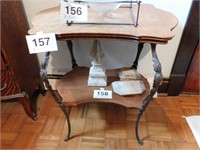 Antique 2 tier oak lamp table w/ curved metal legs