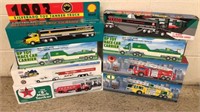 8 mixed toy Gas trucks