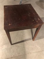 Vintage accent table where the top swivels