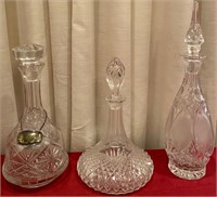 193 - 3 STUNNING CRYSTAL DECANTERS