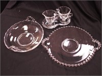 Five pieces of elegant glass including cake