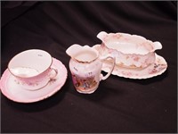 Three vintage china items: moustache cup