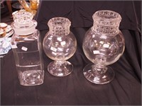 Three apothecary jars: 12" high with lid