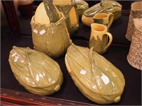 Four pieces of  pottery by Shawnee: cookie jar,