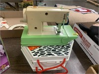TOY SEWING MACHINE AND 2 PLASTIC STORAGE BOXES