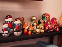 Four sets of Russian nesting dolls; one set