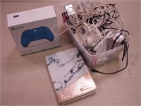 Container of electronics including iPod Nano,