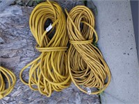 2 Yellow Extension Cords (O)