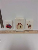 Hallmark keepsake ornaments  mom dad and packed