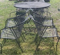 Iron patio table and 4 chairs, 48” W x 30” H