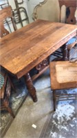 Nice wood primitive table 4 chairs cane bottoms