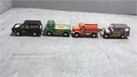 4 tootsie toy trucks