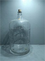 Large glass jug with cork