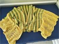 Gold & green knitted shawl & red sweater