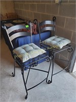 2 black wrought iron bar chairs-match round table