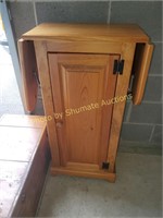 Oak cabinet with ironing board fold-out top & door