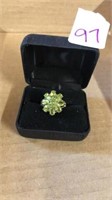 Sterling ring green stones approx size 7.5 with