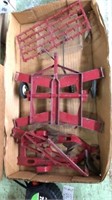 Flat of old farm implement toys. Some marked Ertl