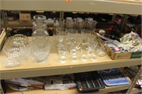 shelf of glasses all sizes