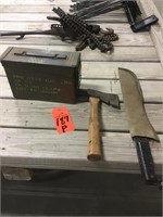 ammo box, corn knife, hatchet