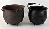 TWO ANTIQUE CAST IRON KETTLES
