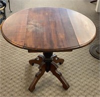 Round Walnut Pedestal Table