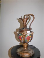 STAIN GLASS PITCHER LAMP; SIX FIGURAL FACES ALONG