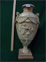 lg. human figure decorated urn
