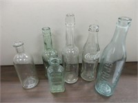 TRAY LOT OF OLD EMBOSSED BOTTLES