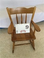 Child’s oak rocking chair